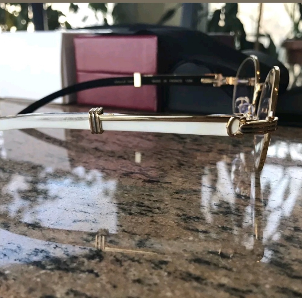 Cartier glasses.